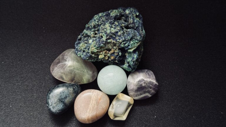 Picture of Azurite, Chevron Amethyst, Yellow Labradorite, Moonstone, Sodalite, Fluorite, and Aquamarine (small sphere).